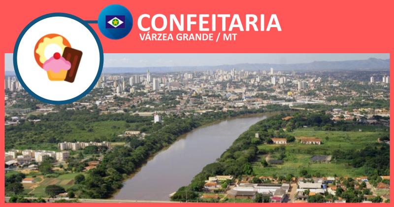Confeiteira decorando bolo em confeitaria em Várzea Grande-MT, cidade conhecida pelos doces artesanais