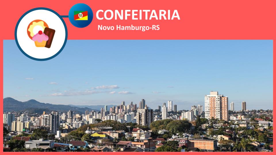 Confeiteira decorando bolo em confeitaria em Novo Hamburgo-RS